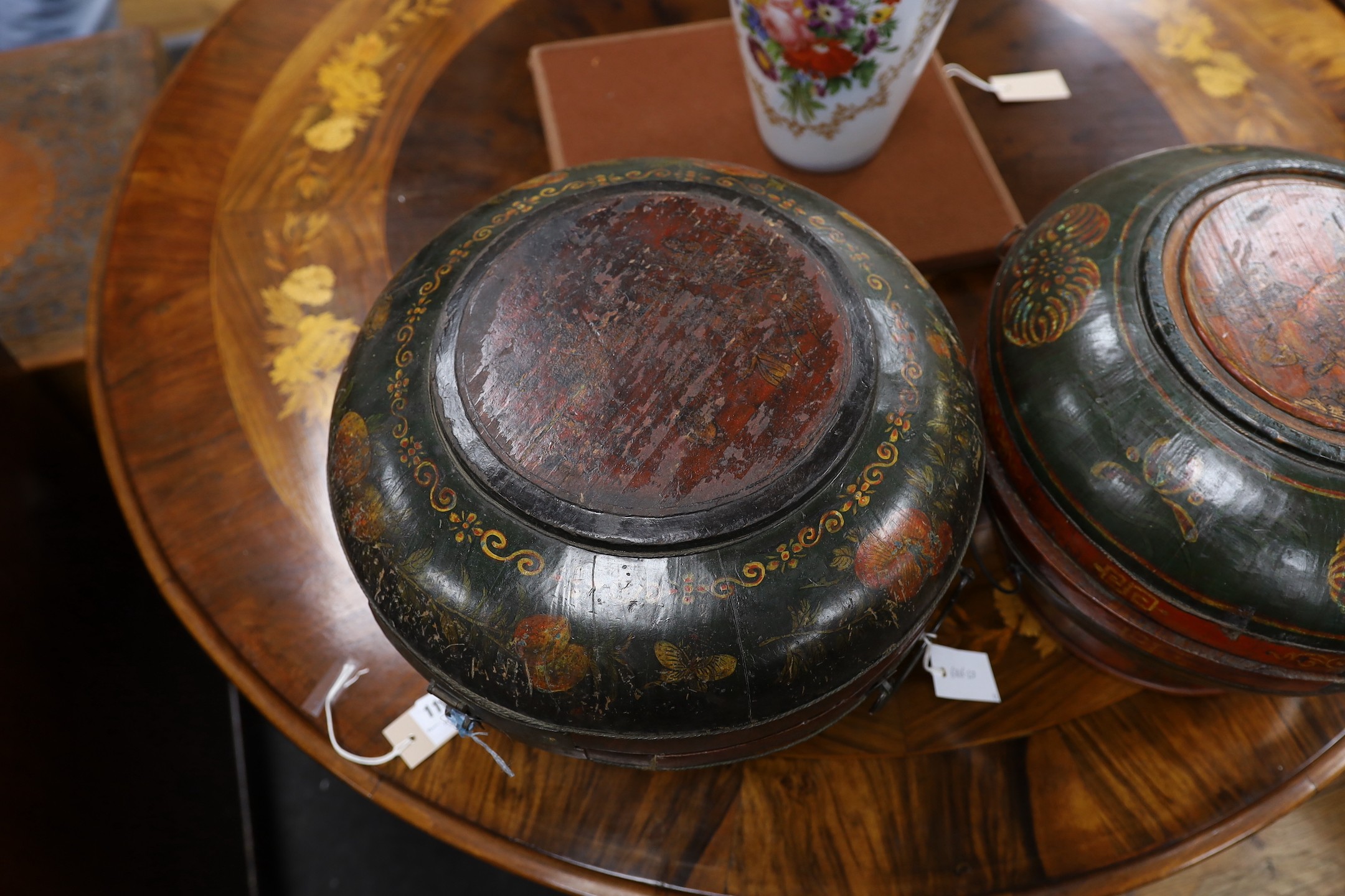 Two similar Southern Chinese polychrome lacquered wedding baskets